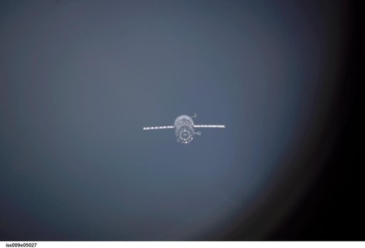 Soyuz TMA-3 separates from the Space Station after undocking, taking the Expedition 8 crew back to Earth