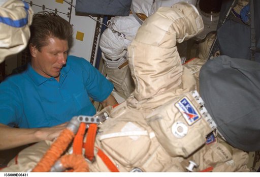 Padalka checks out an Orlan suit during Expedition 9