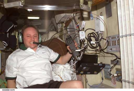 Fincke talks on the ISS Ham radio in the FGB during Expedition 9