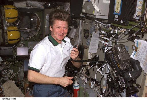 Padalka talks on the ISS Ham radio in the SM during Expedition 9