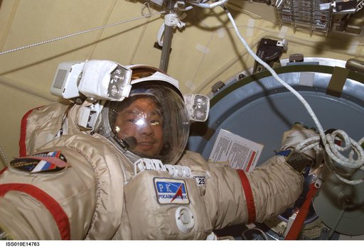 Chiao wearing an EMU in the Airlock during Expedition 10