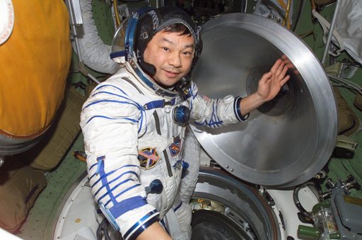 Chiao wearing Sokol suit in the Transfer Compartment of the SM taken during Expedition 10