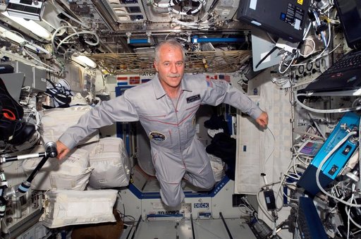 Expedition 11 Science Officer and Flight Engineer John Phillips in U.S. Laboratory.