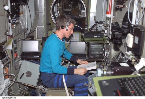 Krikalev works with the TORU teleoperated control system in the SM during Expedition 11