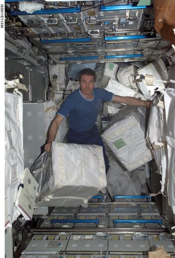 Krkalev with stowage bags in MPLM