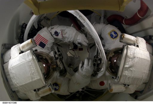 Robinson and Noguchi in orbiter airlock for EVA 1
