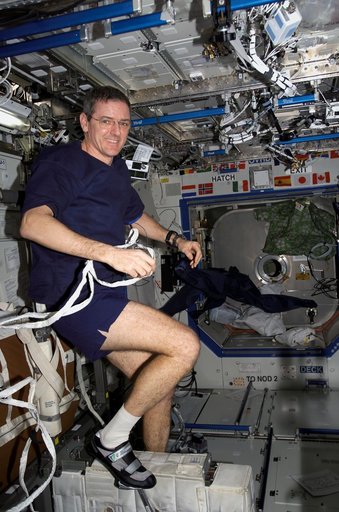 McArthur exercises on the CEVIS on Expedition 12