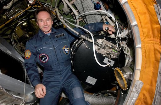 Valery I. Tokarev in the Zvezda Service Module (SM) during Expedition 12