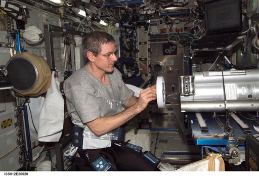 McArthur changes Flexpack during SchRED Flexpack Swap operations on Expedition 12