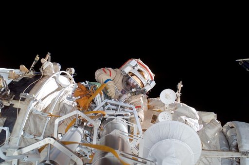 Vinogradov makes a repair to the Elektron vent on the SM during Expedition 13