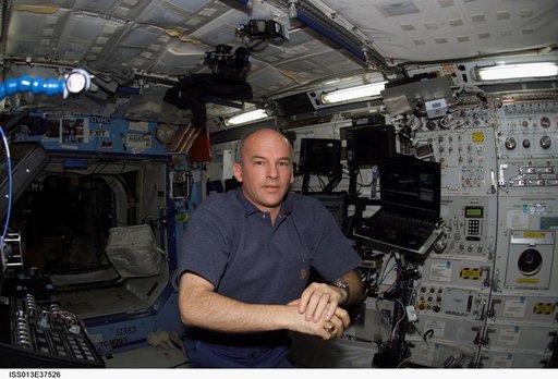 Williams poses for photo in the U.S. Laboratory during Expedition 13