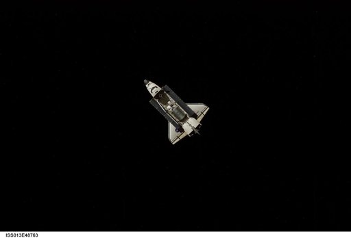 Discovery approaching the ISS for docking during the STS-121 mission