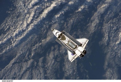 Discovery approaching the ISS for docking during the STS-121 mission