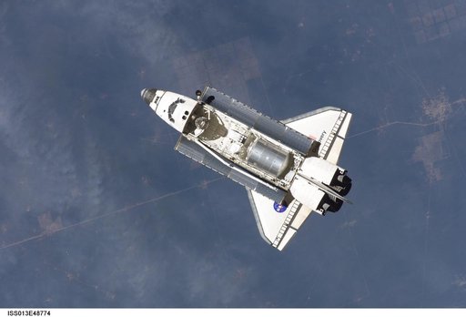 Discovery approaching the ISS for docking during the STS-121 mission