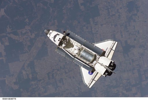 Discovery approaching the ISS for docking during the STS-121 mission