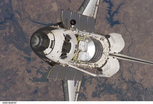 Discovery approaching the ISS for docking during the STS-121 mission