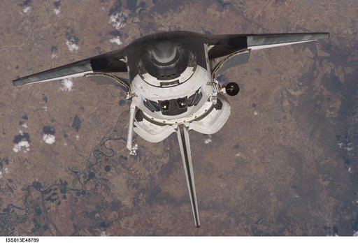 Discovery approaching the ISS for docking during the STS-121 mission