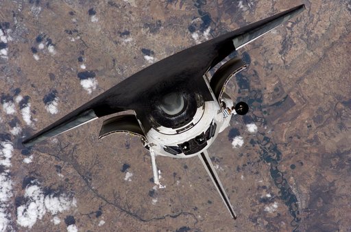 Discovery approaching the ISS for docking during the STS-121 mission