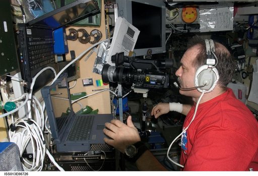 Vinogradov uses a Sony HD Video Camcorder and laptop computer in the SM during Expedition 13