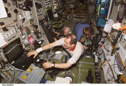 Expedition 13 Crew taking photos in the SM