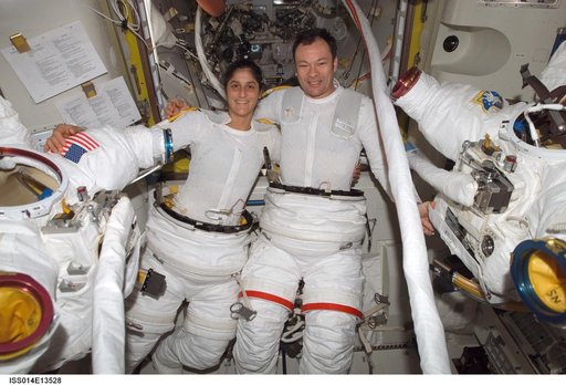 Lopez-Alegria and Williams in Quest airlock