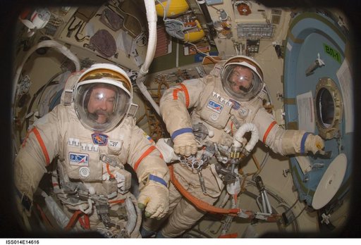 Lopez-Alegria and Tyurin in Pirs prior to EVA 17A