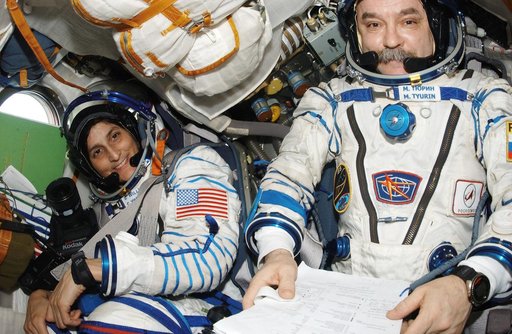 Tyurin and Williams in Soyuz 13 spacecraft
