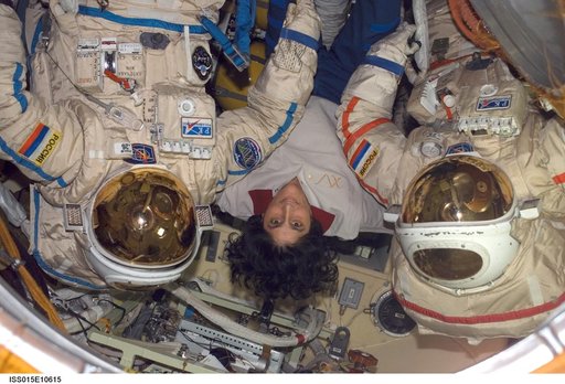 Williams poses for a photo in the DC1 during Expedition 15