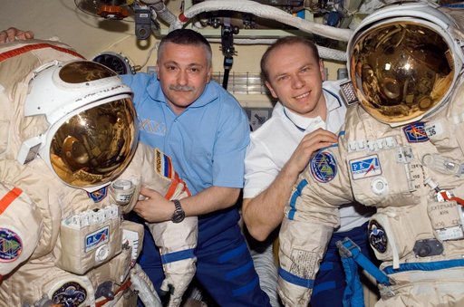 Yurchikhin and Kotov pose for a photo in the DC1 during Expedition 15