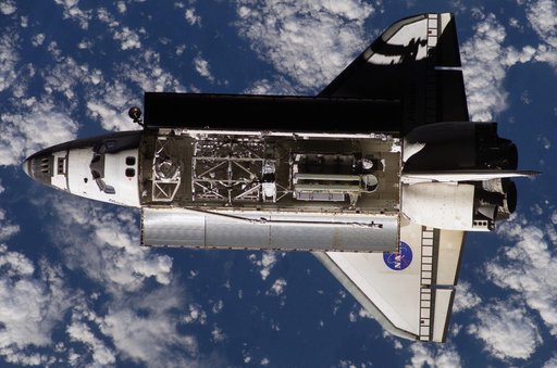 Atlantis and Payload on approach to the ISS during the STS-117 Mission