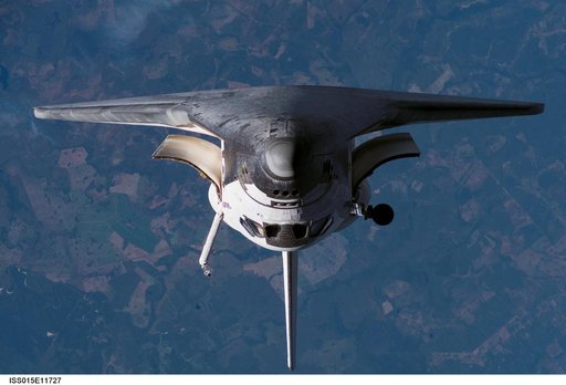 Atlantis and Payload on approach to the ISS during the STS-117 Mission