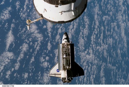 Atlantis and Payload on approach to the ISS during the STS-117 Mission