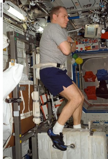 View of Kotov exercising on the CEVIS during Expedition 15