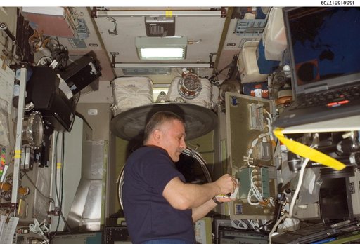 View of Yurchikhin working on SMCC2 Command Processing Unit during Expedition 15