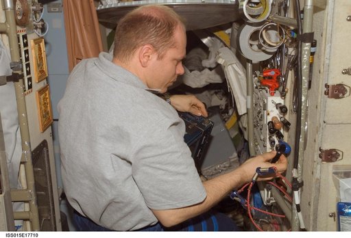 View of Kotov installing LADA-MIS Hardware in the SM during Expedition 15