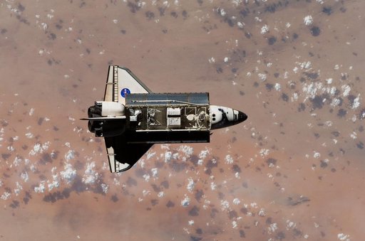 Endeavour and Payload on approach to the ISS during the STS-118 Mission