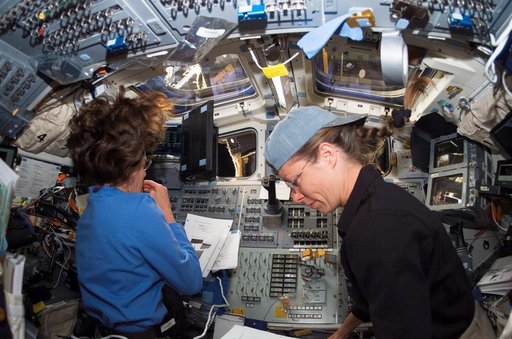 Morgan and Caldwell work in the aft FD during STS-118