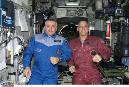 View of Yurchikhin and Anderson posing for a photo in the SM during Expedition 15
