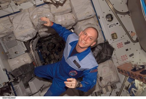 View of Anderson posing for a photo in the Node 1 during Expedition 15
