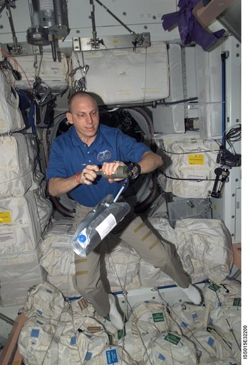 View of Expedition 15 FE Anderson performing the ANITA Experiment in the Node 1