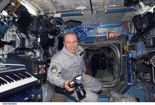 Expedition 15 FE Kotov poses for a photo in the US Lab