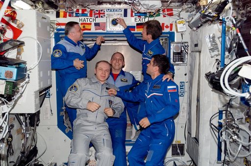 Expedition 15/Expedition 16 Crewmembers pose for a photo