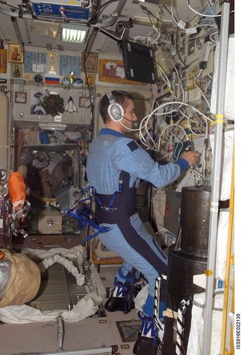 Malenchenko uses communication equipment in the SM