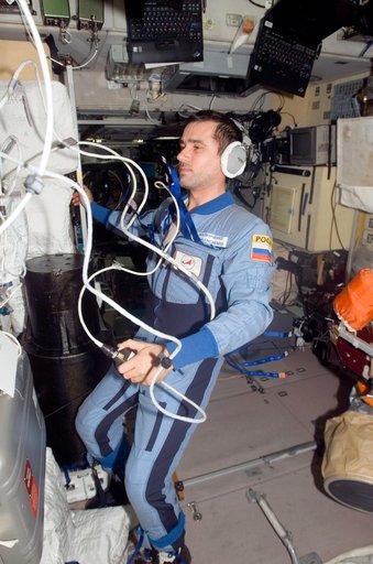 Malenchenko uses communication equipment in the SM