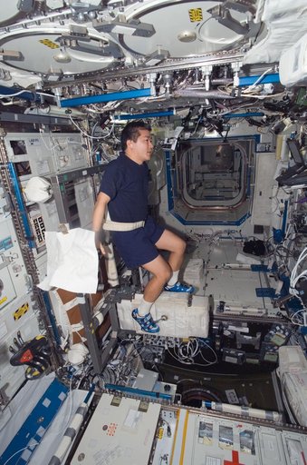 Tani Exercises on the CEVIS in the US Lab