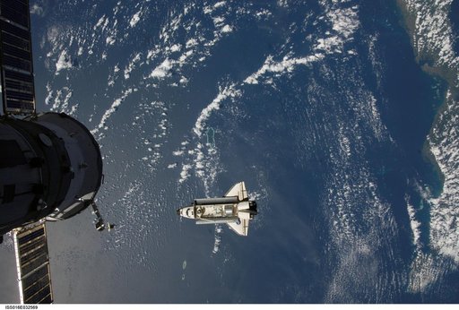 Endeavour and Payload on approach to the ISS during the STS-123 Mission