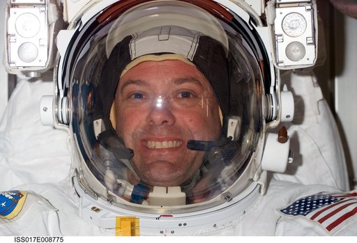 Garan wearing EMU in the A/L during Expedition 17