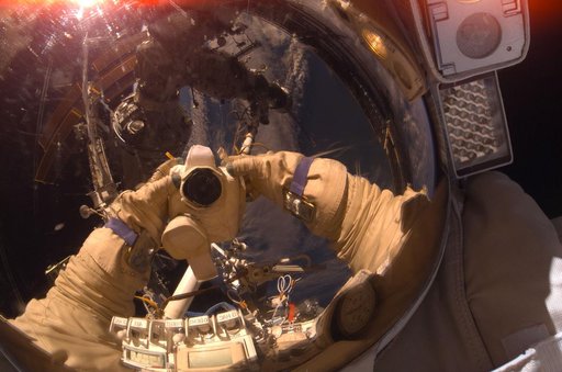Kononenko taking photo during ISS Russian EVA 20 on Expedition 17