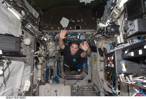 Chamitoff floats in the U.S. Laboratory during Joint Operations