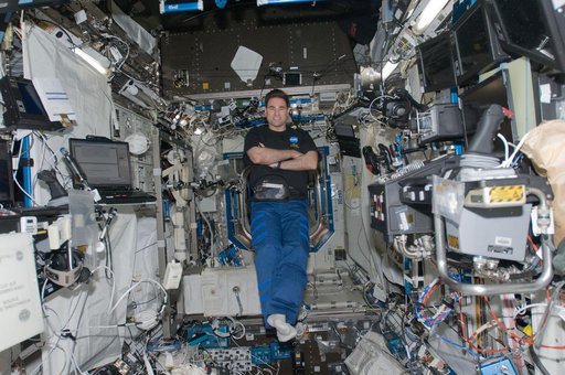 Chamitoff floats in the U.S. Laboratory during Joint Operations